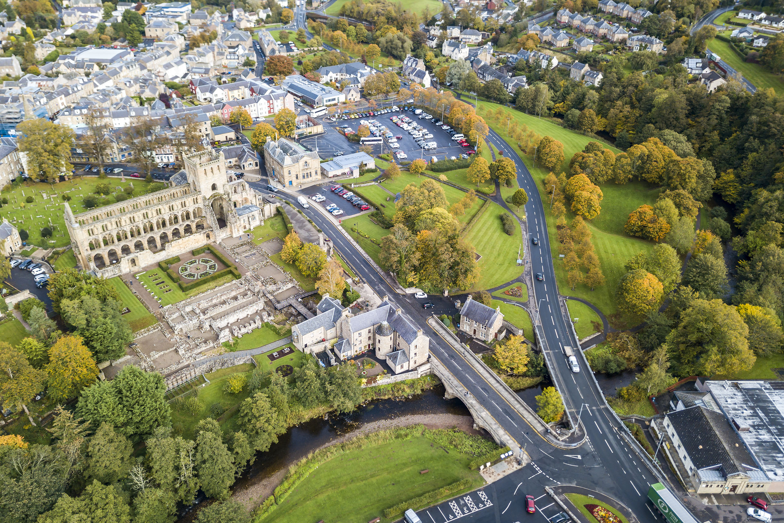 Aerial view of Jedburgh in autumn with the ruins of Jedburgh Abbey in Scotland - United Kingdom